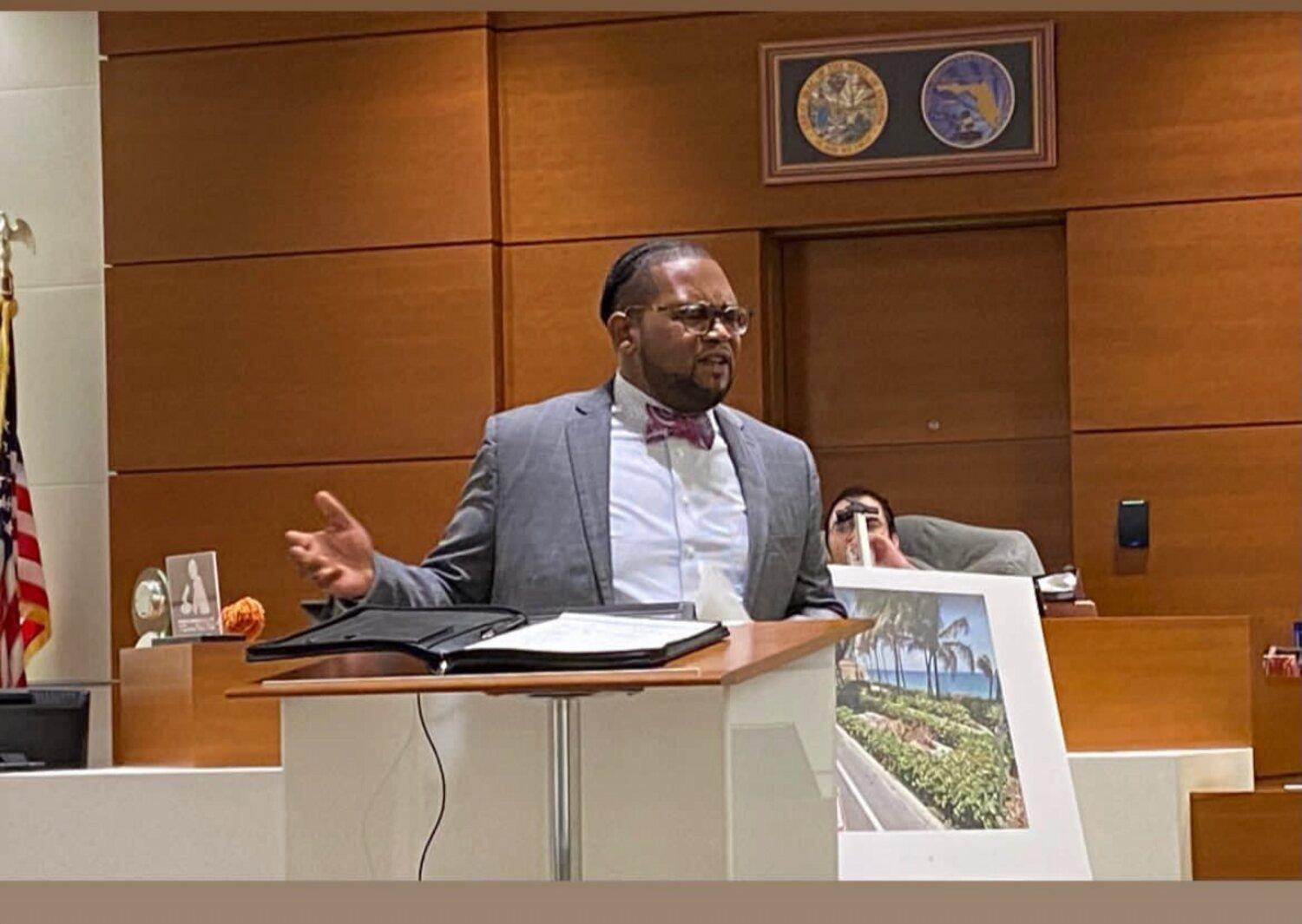 Dwayne A. Estelle presenting a case at the podium